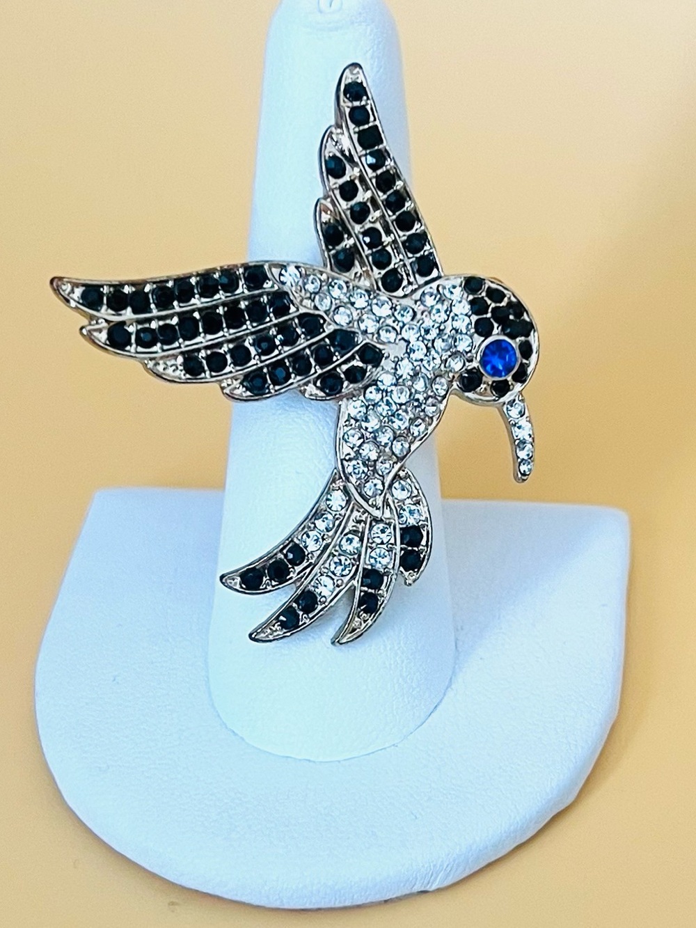 Paved Humming bird ring size 7, gold tone